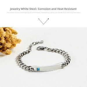 Polished stainless steel Cuban chain bracelet featuring a blue square gemstone inlay