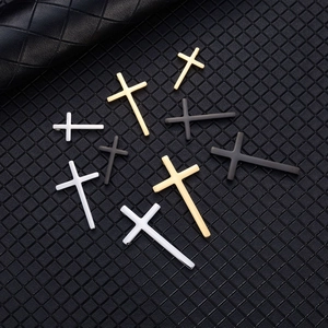 Polished stainless steel cross pendants in gold, silver and black with various sizes
