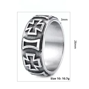 Detail view of retro stainless steel cross ring with 3mm thickness and embossed iron cross