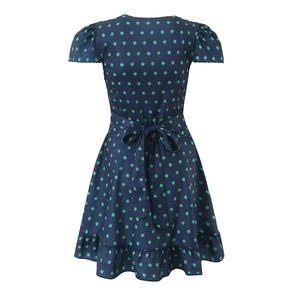 Back view of navy short sleeve dress with floral print and waist tie-up bow detail