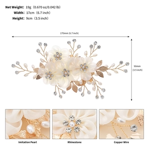 Detail view of flower hair clip with dimensions 17x9cm and pearl rhinestone accents