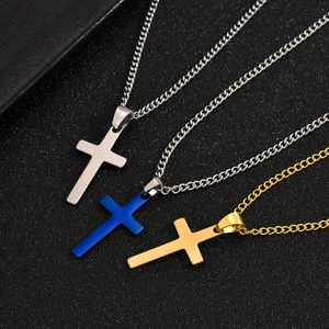 Titanium steel cross necklaces in silver, blue, and gold finishes on black texture