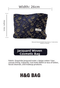 Detailed view of dark blue daisy jacquard makeup bag with 26x18cm dimension markings