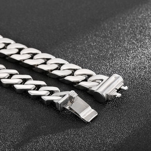 Sleek silver stainless steel Cuban link bracelet for men with secure clasp closure