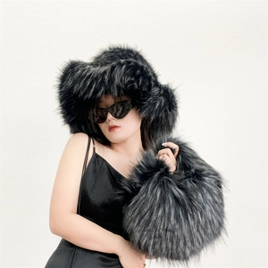 Detail of fluffy faux fur handbag and matching plush hat in punk style Y2K fashion
