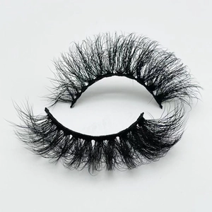 Macro shot of 20mm fluffy faux mink eyelashes with dense volume and natural messy curl