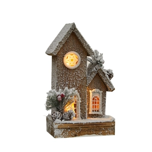 Illuminated wooden Christmas snow house ornament with warm LED lighting and white snow details