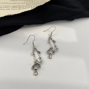 Gothic mushroom paperclip earrings in retro oxidized silver finish on a white background