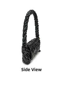Side view detail showing braided oil wax leather texture and thickness of crossbody bag