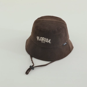 Detail of dark brown corduroy bucket hat with Florida embroidery and adjustable chin strap