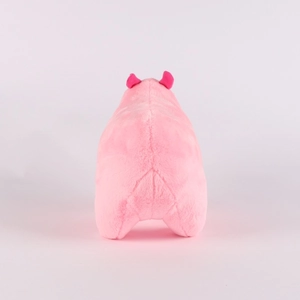 Rear view of a pink plush capybara toy showing soft fur texture and cute dark pink ears
