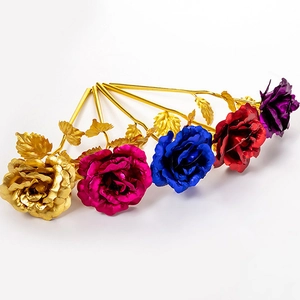 Detailed row of five colorful gold foil roses in gold, magenta, blue, red and purple