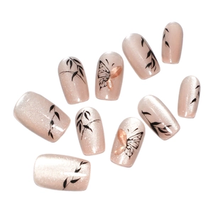 Lot de 10 faux ongles œil de chat nude avec motifs bambou et papillon style encre