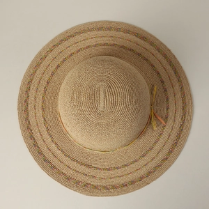 Wide brim raffia straw sun hat with colorful woven stripes for summer beach sun protection