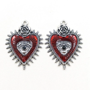 Gothic punk silver heart pendant with red eye enamel and rose flower detail