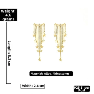 Detailed view of long gold star tassel earrings with 925 silver needles and crystal charms