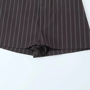 Vertical striped slim fit shorts for women in charcoal gray with a classic pinstripe pattern