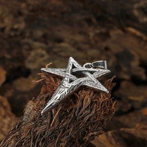 Silver stainless steel Viking pentagram pendant with devil eye texture on wood