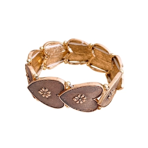 Vintage gold heart-shaped elastic bracelet with floral embossment and brushed metal finish