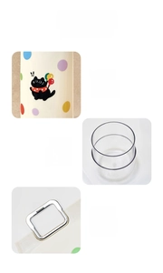 Gros plan de la boîte à brosses à dents avec autocollant chat et poignée métallique
