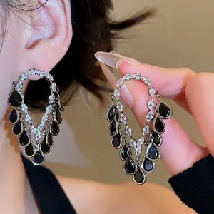 Vintage 18K gold plated silver stud earrings with black teardrop stones and zircons