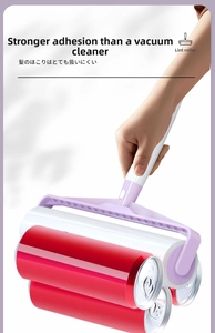 Strong adhesive lint roller lifting three cans to demonstrate its powerful suction