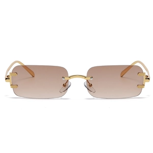 Fashionable rimless sunglasses with brown gradient lenses and gold C-decor metal temples