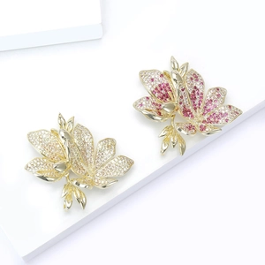 Elegant gold flower brooch with pink and white cubic zirconia crystals for women