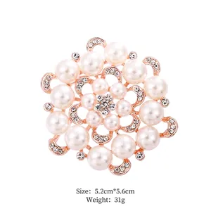Elegant rose gold flower brooch with white pearls and sparkling crystals, 5.2cm x 5.6cm size