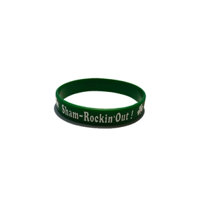 Close-up of green silicone St. Patrick's Day bracelet with white Sham-Rockin' Out! text