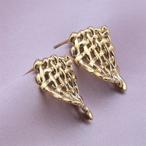 Macro shot of 304 stainless steel golden earrings featuring an intricate woven mesh design