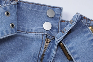 Detail of denim waist with double metal buttons and high quality SBS zipper closure