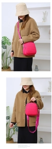 Rose red quilted nylon bag shown in crossbody and handheld styles with wide strap