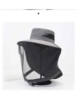 Detail of dark grey anti-mosquito hat featuring breathable mesh and adjustable drawstring