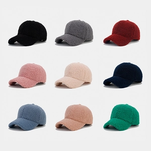Multiple colors of thick sherpa fleece baseball caps in a grid display for winter