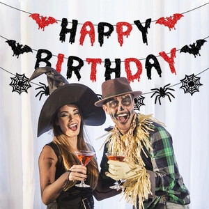Detail of glitter Halloween Happy Birthday banner with blood drip letters and bats