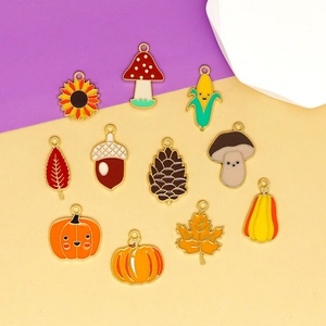 Set of 11 Thanksgiving enamel charms with pumpkin mushroom leaf and acorn motifs