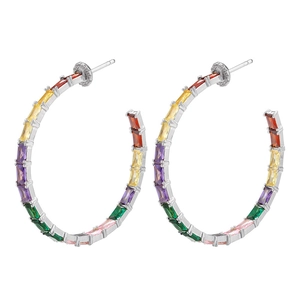 Close-up of C-shaped silver earrings set with vibrant rainbow baguette-cut cubic zirconia stones
