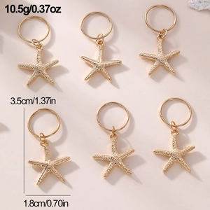 Detailed view of 6-piece gold starfish hair rings with weight and size specifications