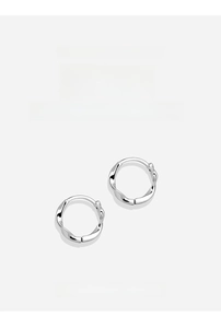 Macro detail of hypoallergenic S999 silver Mobius twist hoop earrings for sensitive ears