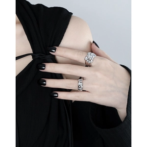 Minimalist S925 sterling silver wide ring with irregular lava texture shown on model