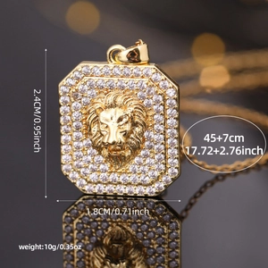 Gold lion head square pendant necklace with clear zircon stones on black background