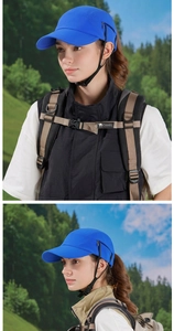 Detail of blue outdoor hat featuring adjustable chin strap and breathable fabric