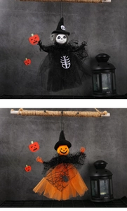 Detail of Halloween witch and pumpkin hanging dolls with mesh skirts and spider patterns