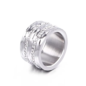 Silver wide stainless steel ring featuring hammered texture and double row of rhinestones