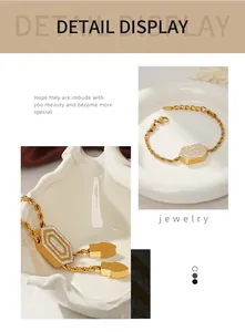 Detailed macro view of gold-plated hexagonal pendant with pavé set zircon stones on rope chain