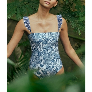 Blue one-piece swimsuit with dragonfly floral print and double ruffled shoulder straps