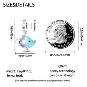 Luminous blue fish charm with cubic zirconia showing dimensions and size comparison