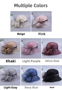 Detail view of lightweight organza sun hats with delicate layered mesh flowers in 8 colors