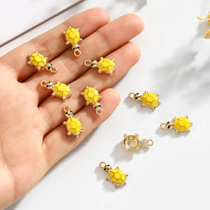 Colorful turtle pendants for DIY jewelry with yellow enamel and gold metal frame